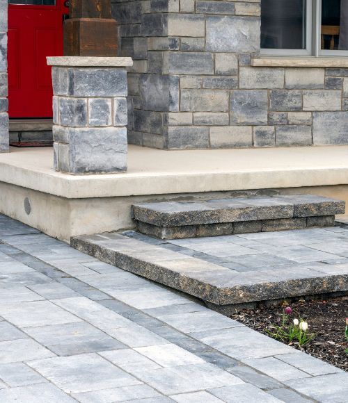 stone patio and driveway in the front yard