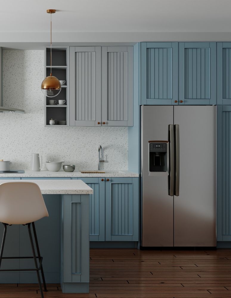 Remodeled kitchen with blue and white cabinets